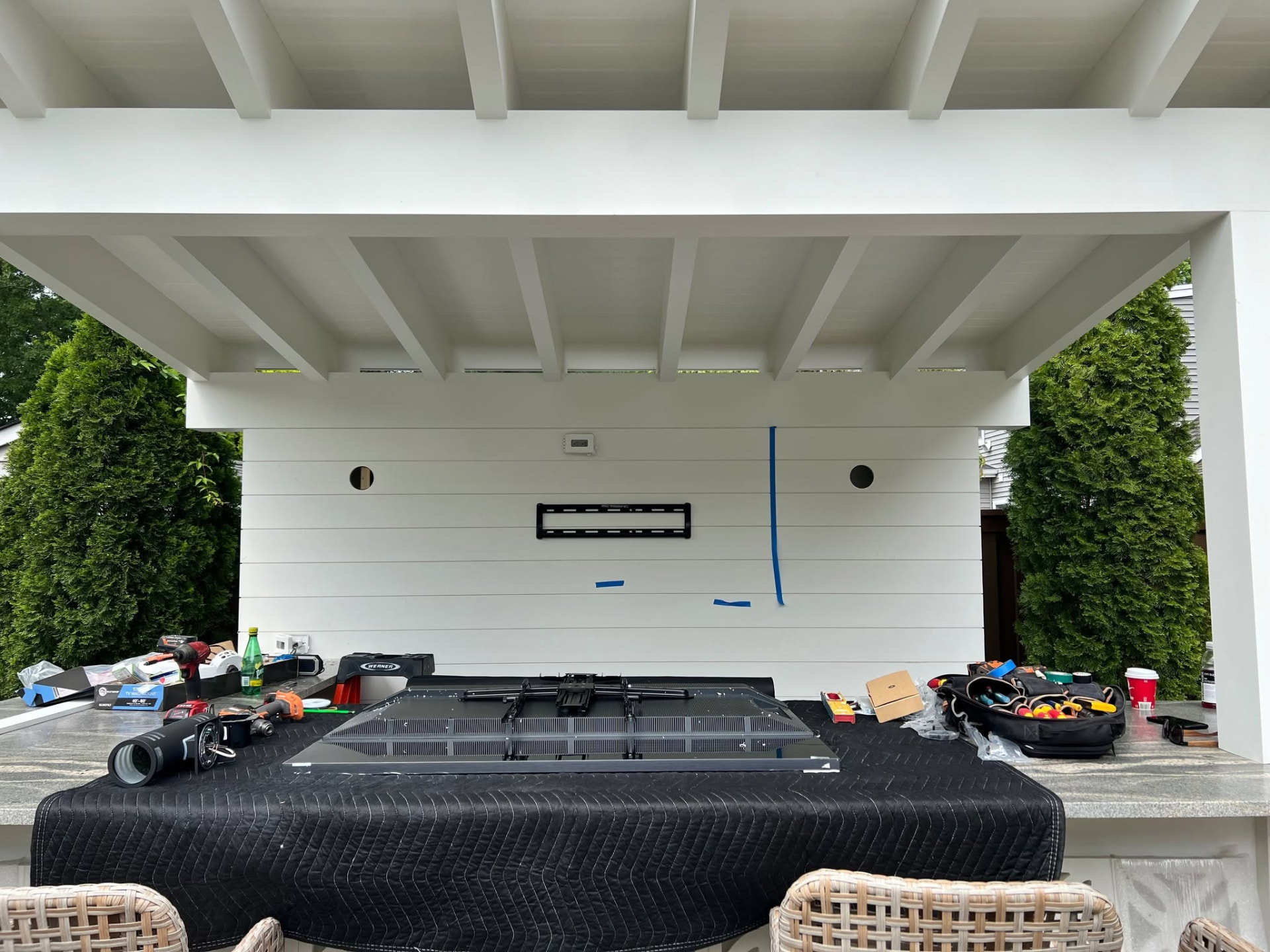 Patio wall prepped before television and speaker wiring