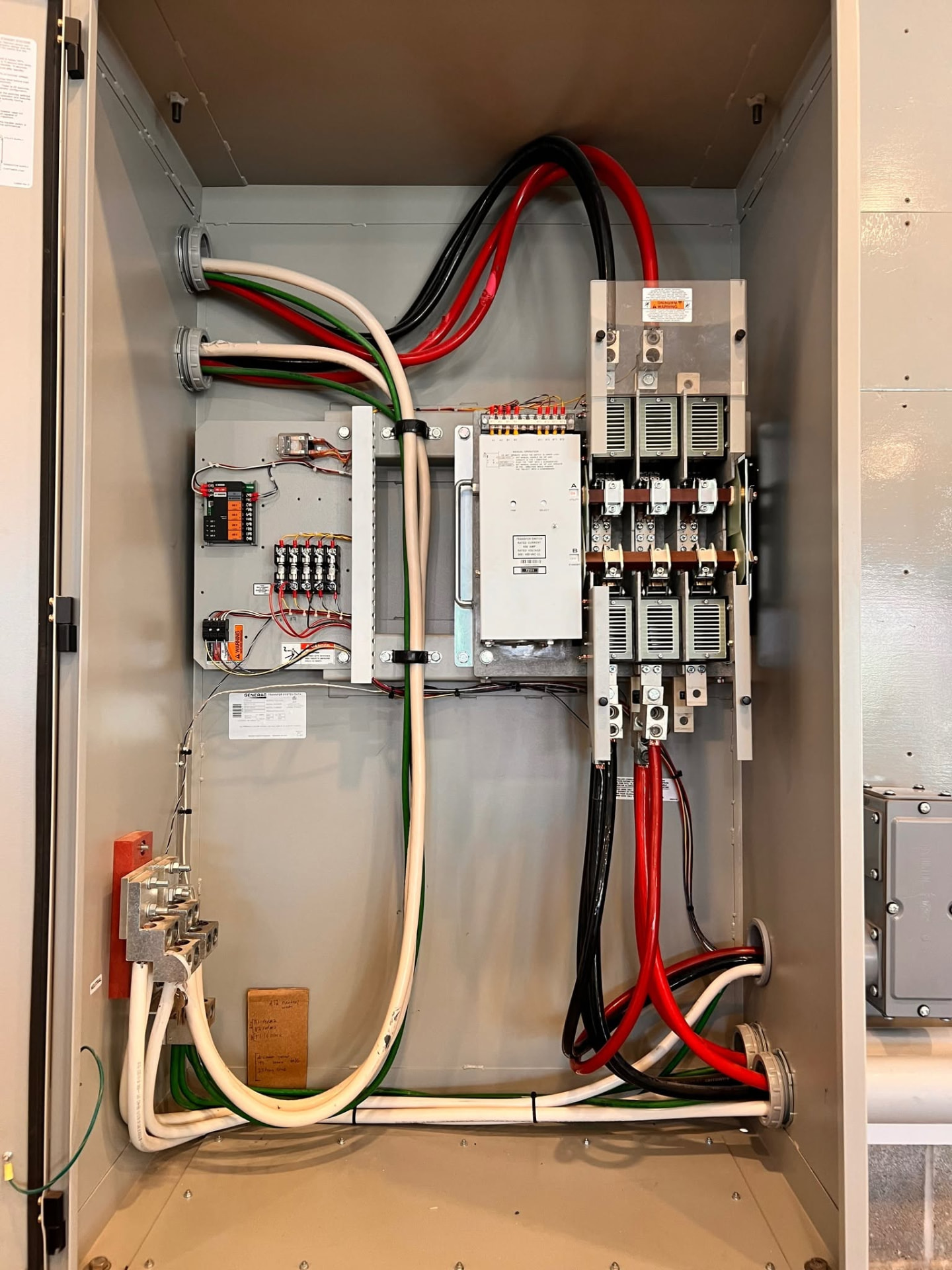 Neatly wired Generac automatic transfer switch installed by Garden State Electrical Contractors